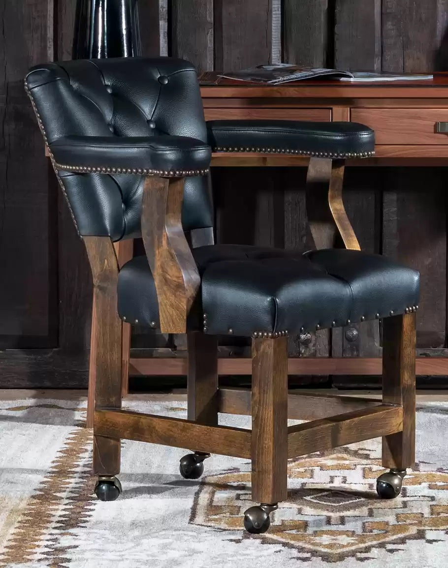 Black Tufted Leather and Hide Chair with Casters
